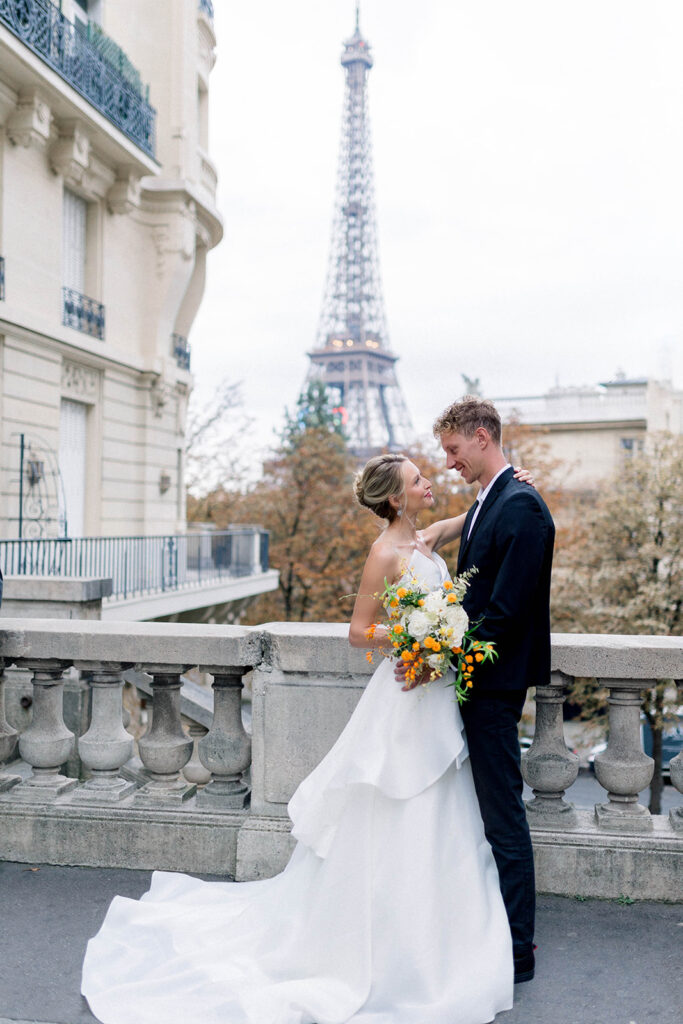 bride and groom photos with Eiffel Tower in Paris - Best destination wedding cities