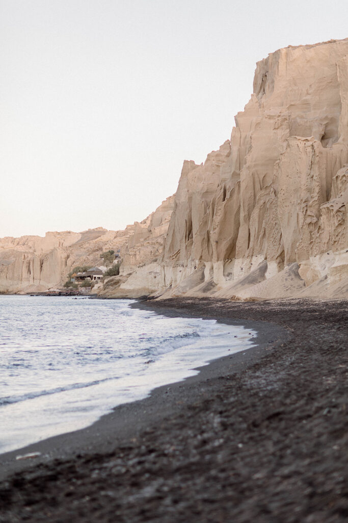 Santorini sunrise beach elopement bride and groom at the beach