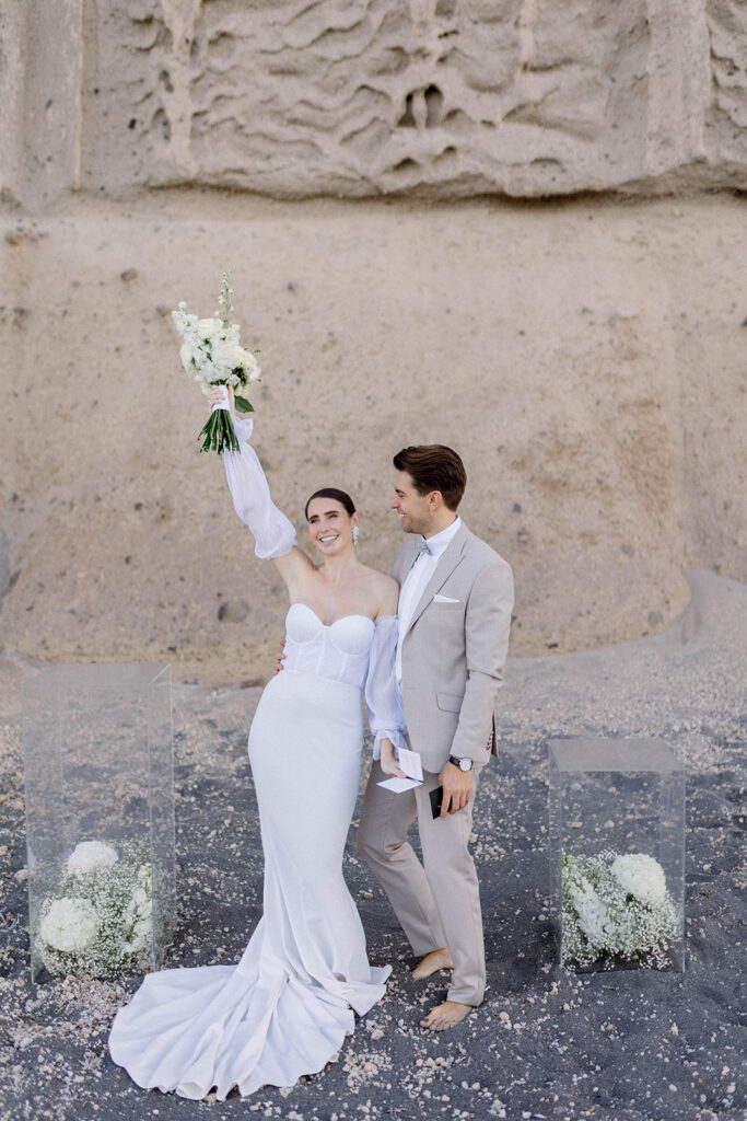 Santorini sunrise beach elopement bride and groom at the beach
Three Key Things To Consider When Planning a Coastal Wedding